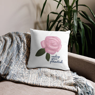 Alpha Xi Delta Realize Motto Pillow in white in 18 x 18 size shown on couch