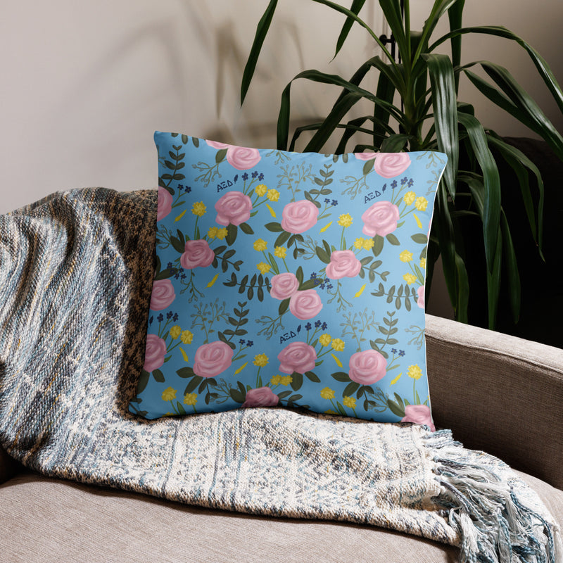 Alpha Xi Delta 1893 Sorority Pillow in 22 x 22 size showing floral print in light blue on back