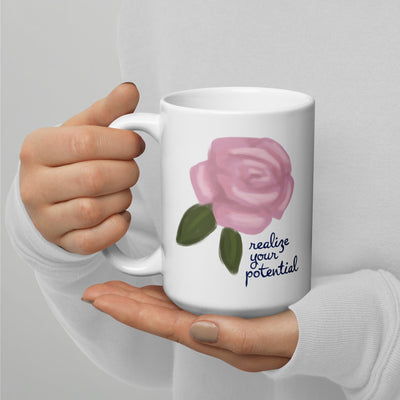 Alpha Xi Delta Mom 15 oz Mug showing motto on reverse side in model's hands