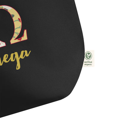 Chi Omega Letters Tote Bag in black showing certified organic cotton label
