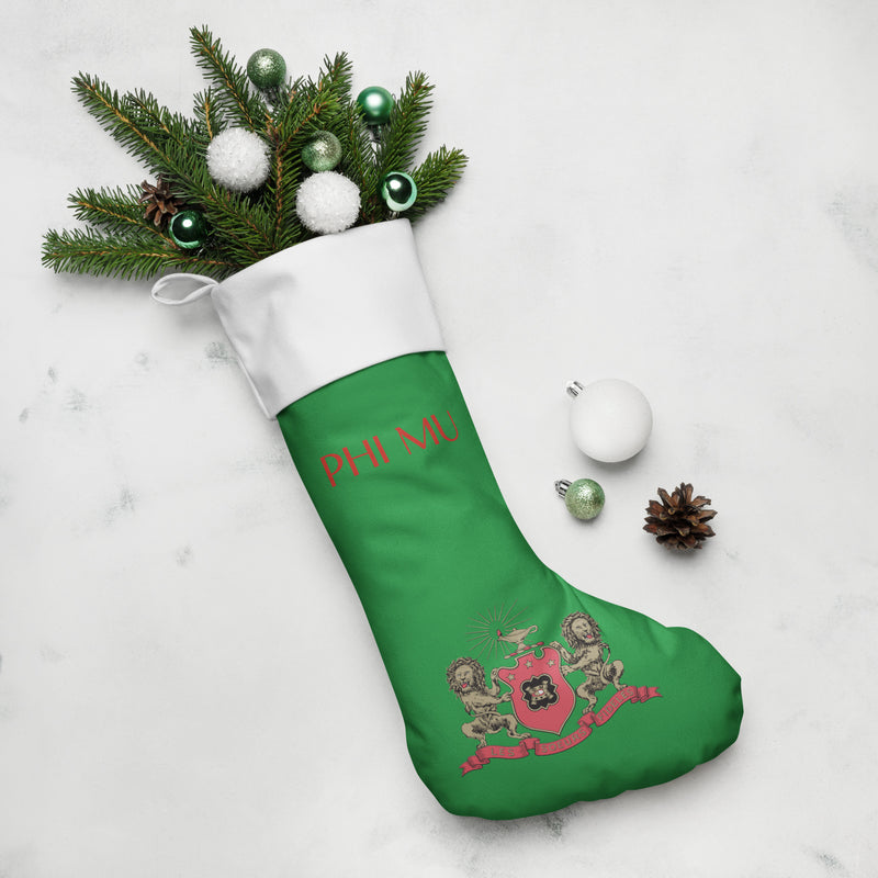 Phi Mu Coat of Arms Holiday Stocking in green with pine branches
