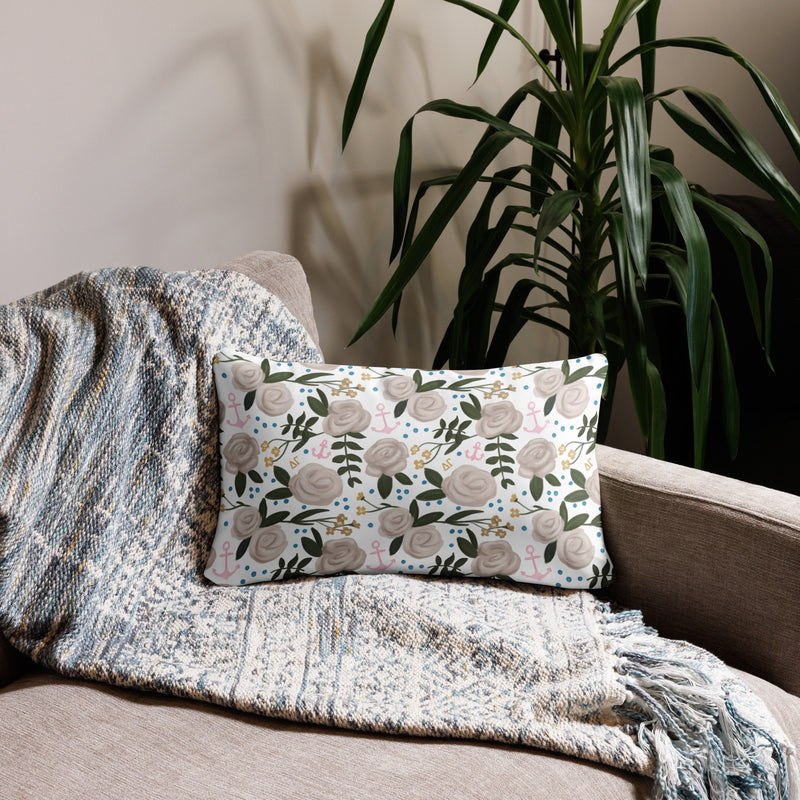 Delta Gamma Sorority Pillow showing rose floral print back on couch