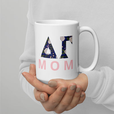 Delta Gamma Mom Mug in 15 oz size in model's hands with Dee Gee letters