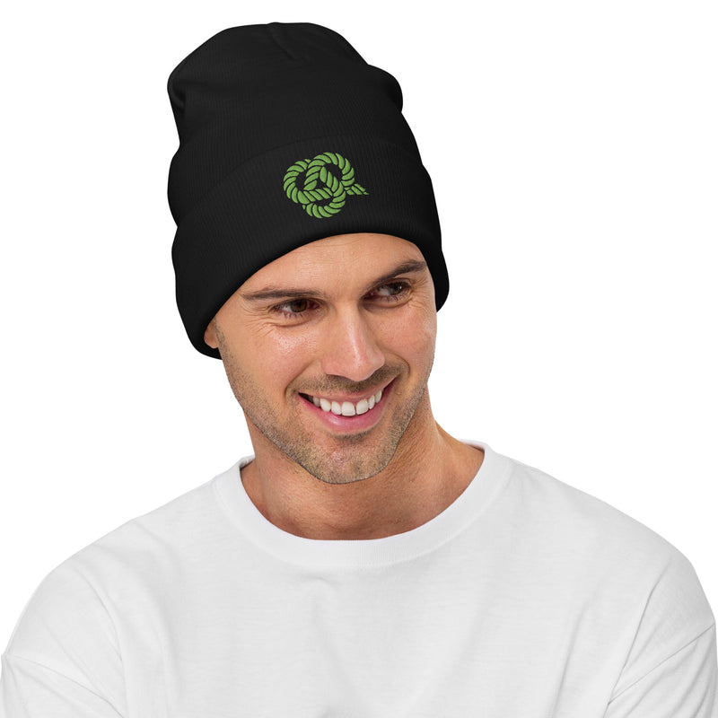 Delta Sigma Phi Knot Beanie in black with green knot symbol on front shown on model