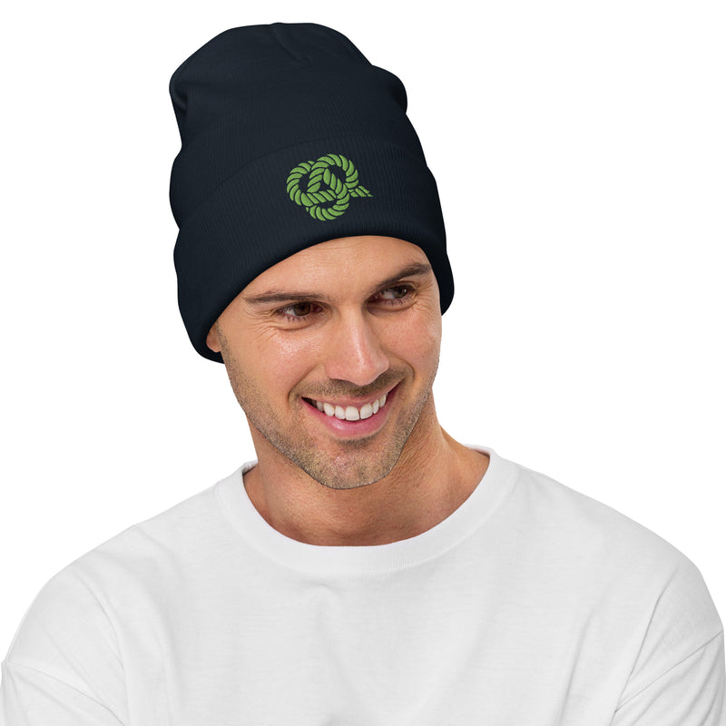 Delta Sigma Phi Knot Beanie in Navy with green knot symbol on front shown on model