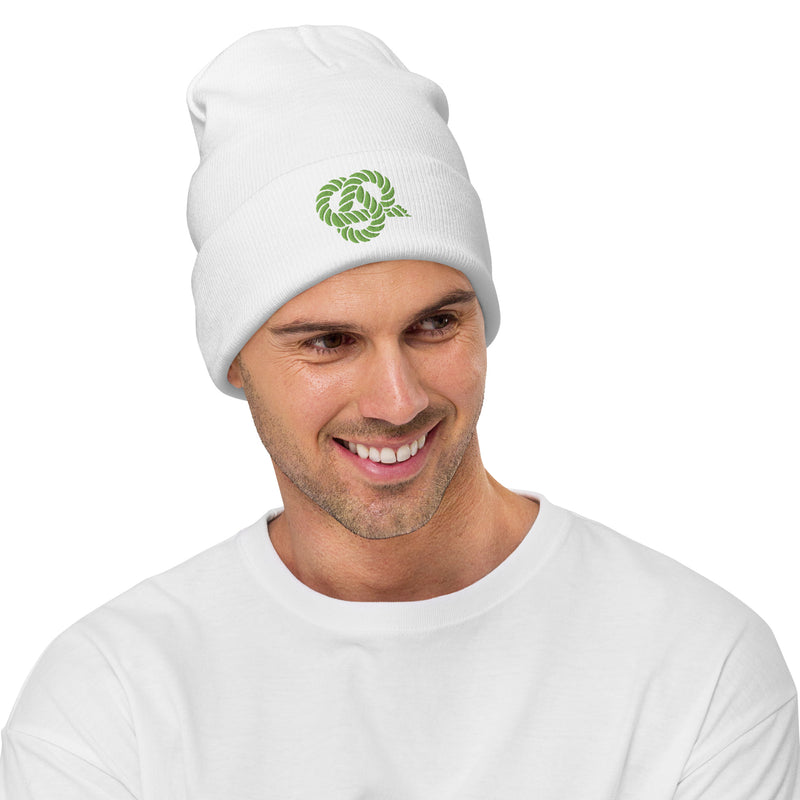 Delta Sigma Phi Knot Beanie in white with green knot symbol on front shown on model