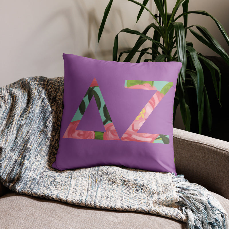 Delta Zeta Sorority Pillow in 22" x 22" size with DZ letters shown on couch