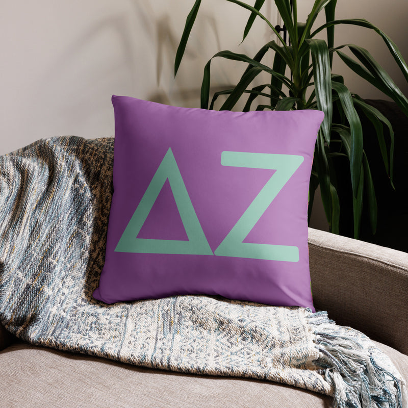 Delta Zeta Sorority Pillow in 22" x 22" size with letters in green on purple pillow