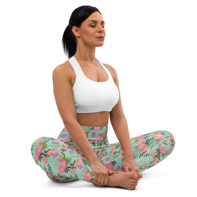 Delta Zeta Sorority Leggings with rose floral print in green shown on model in yoga pose