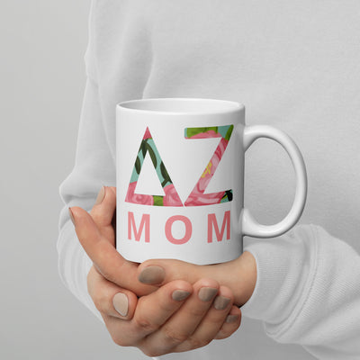 Delta Zeta Sorority Mom Mug in 11 oz size shown in model's hands