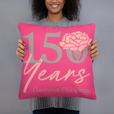 150th Anniversary Reversible Pillow in Carnation (pink) in woman's hands