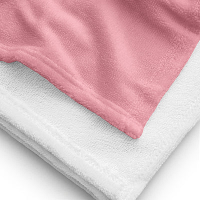 Gamma Phi Beta Crescent Moon towel showing white reverse side