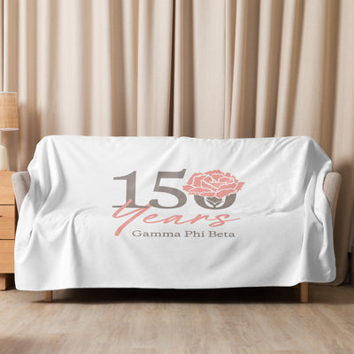 Gamma Phi Beta 150th Anniversary Blanket in 60" x 80" size shown on couch