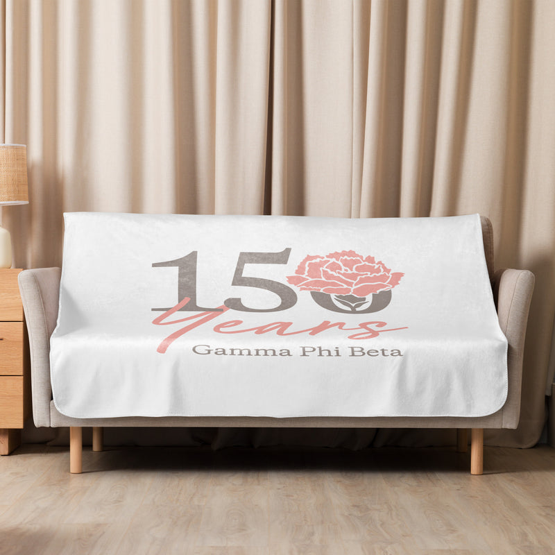 Gamma Phi Beta 150th Anniversary Blanket in 50" x 60" size shown on couch