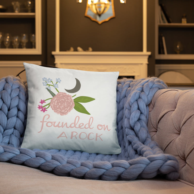gamma phi beta founded on a rock pillow in 22" x 22" size shown on couch