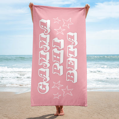 Gamma Phi Beta Sorority Beach Towel held up by model on beach