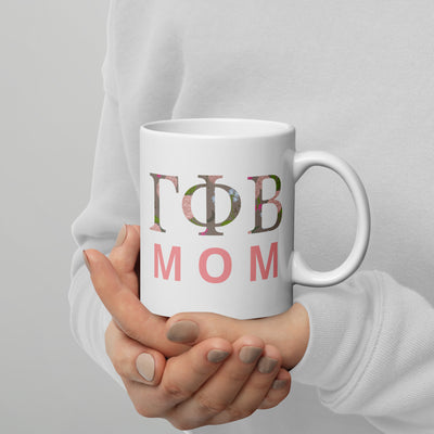 Gamma Phi Beta Sorority Mom Mug in 11 oz size shown in model's hands