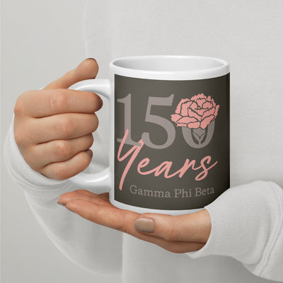 Gamma Phi Beta 150th Anniversary Mug in 20 oz size in brownstone in model's hands