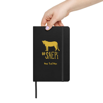 Sigma Lioness Hardcover Journal Book in black in woman's hand