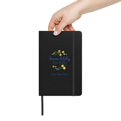 Kappa Kappa Gamma Dream Boldly. Live Fully. Journal in black in woman's hand