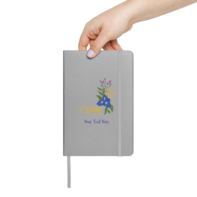 SAEII 1998 Hardcover Journal in silver in woman's hand