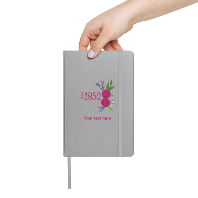 Phi Mu 1852 Personalized Journal Notebook in silver in woman's hand