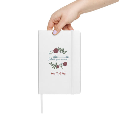 Pi Phi Follow Your Arrow Hardcover Journal in white in woman's hand