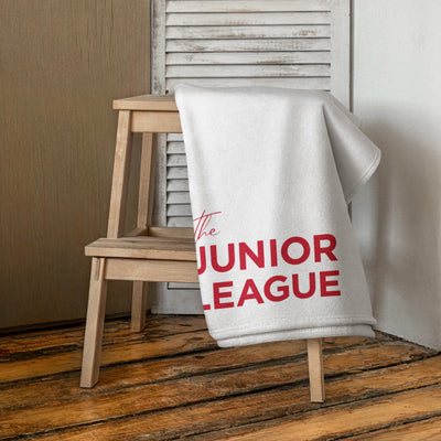 Junior League Beach and Bath Towel in white shown in bathroom scene