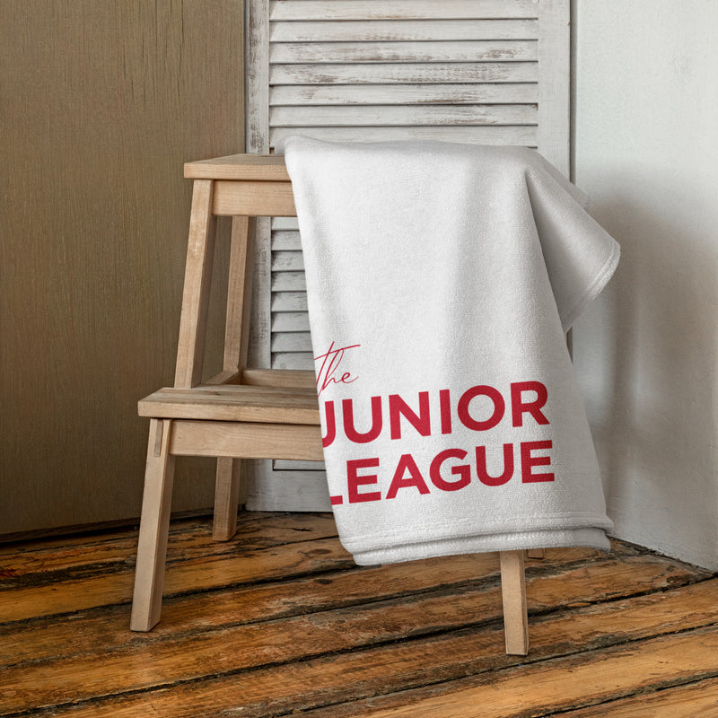 Junior League Beach and Bath Towel in white shown in bathroom scene