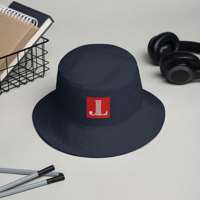 Junior League Logo Bucket Hat in Navy blue shown in lifestyle setting