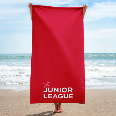 Junior League Red and White Beach Towel shown in a beach scene