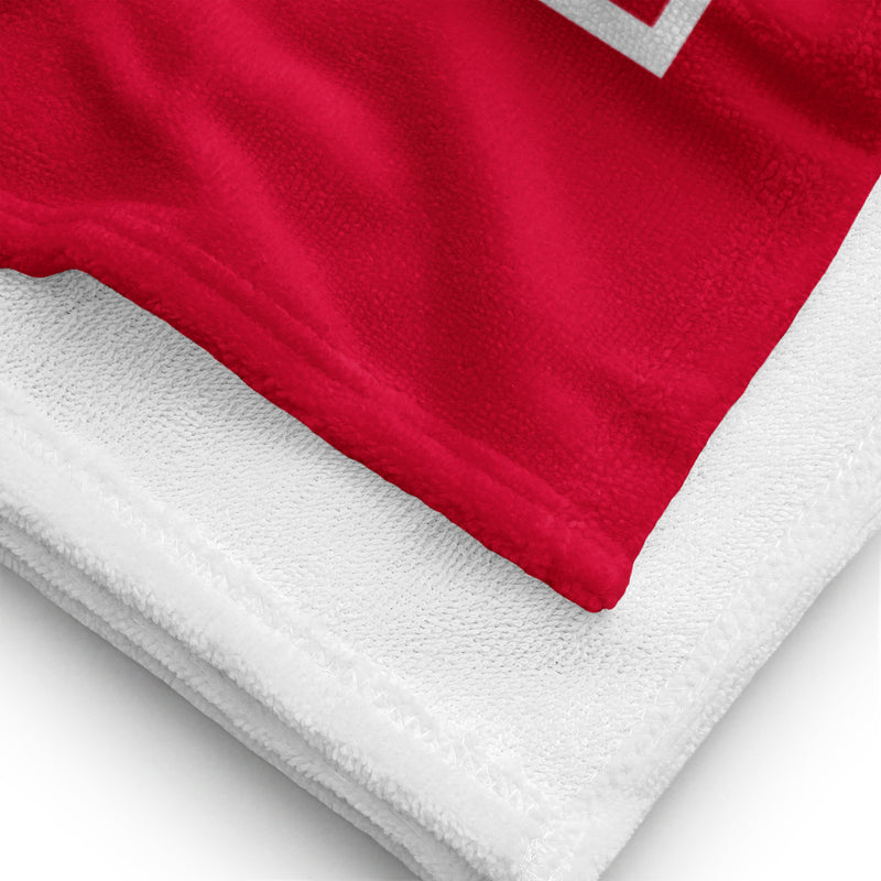 Junior League Red and White Beach Towel showing solid white reverse side