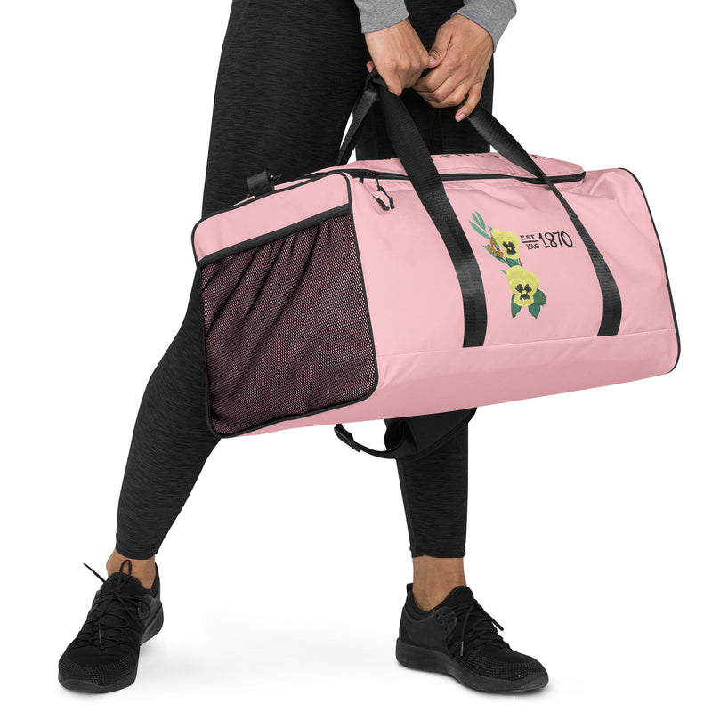 Kappa Alpha Theta Pink Duffel Bag showing being held by model