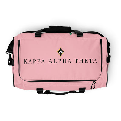 Kappa Alpha Theta Pink Duffel Bag showing Theta logo on top of bag