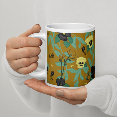 Kappa Alpha Theta Floral Sorority Mug in 20 oz size shown in model's hands