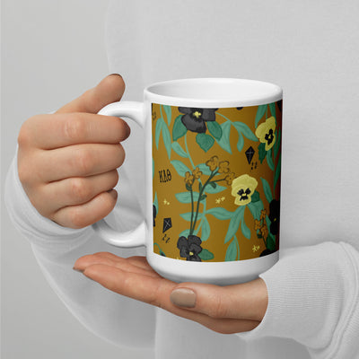 Kappa Alpha Theta Floral Sorority Mug in 15 oz size in model's hands