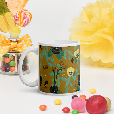 Kappa Alpha Theta Floral Sorority Mug in 11 oz size shown in colorful setting