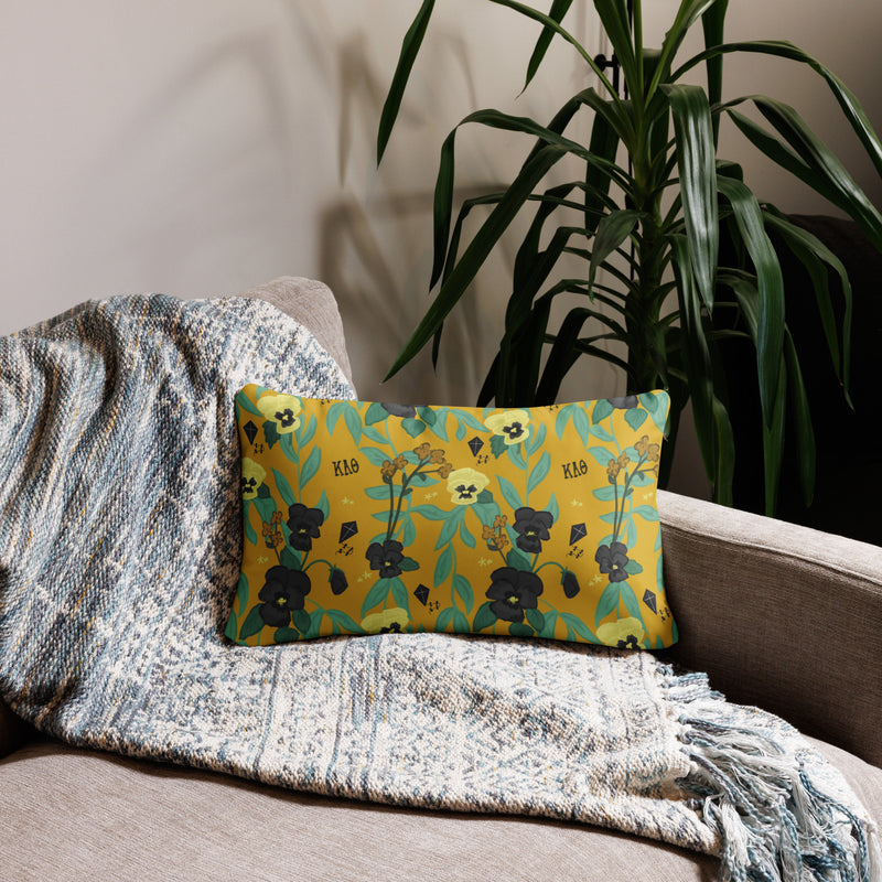 Kappa Alpha Theta letters pillow showing reverse side with pansy floral print