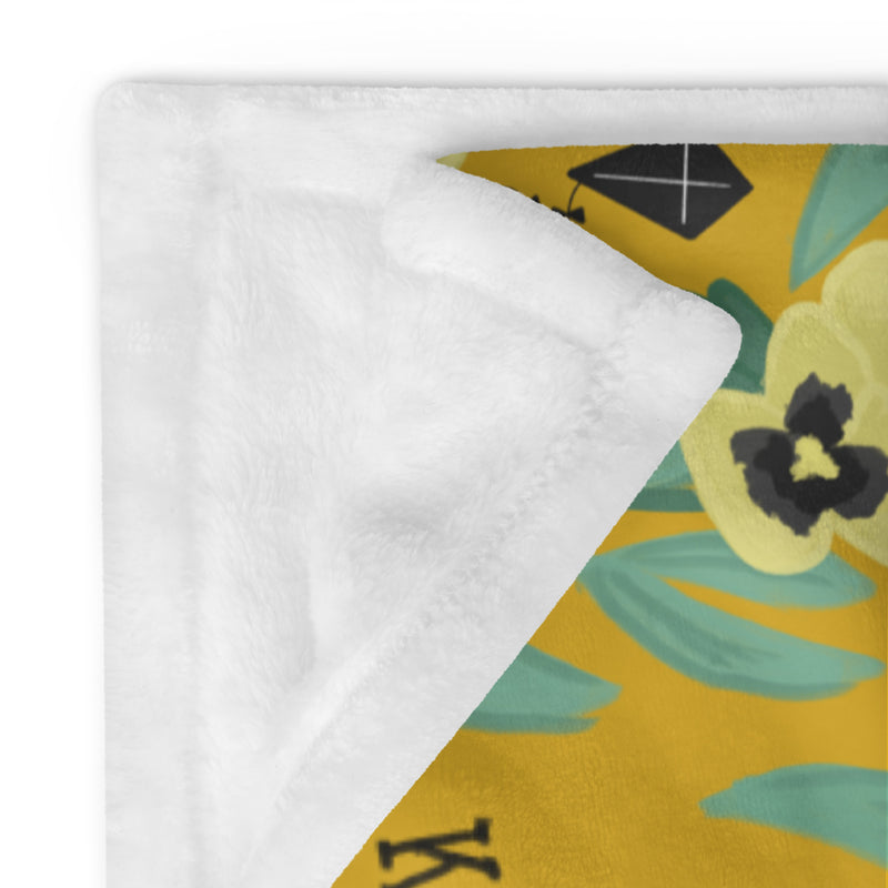 Kappa Alpha Theta Pansy Floral Print Sorority Blanket showing solid white reverse side
