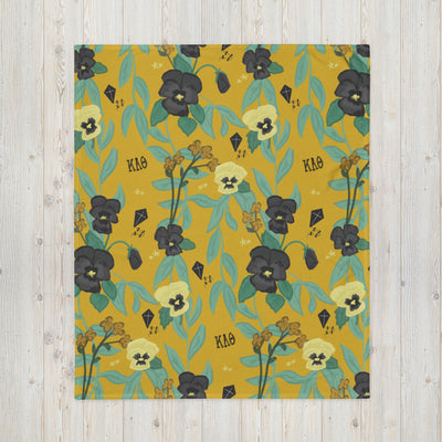 Kappa Alpha Theta Pansy Floral Print Sorority Blanket shown flat in gold