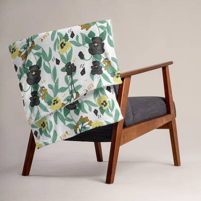 Kappa Alpha Theta Pansy Throw Blanket, White on chair