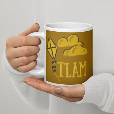 Kappa Alpha Theta TLAM Gold Sorority Mug in 20 oz size shown in model's hands