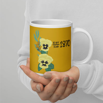 Kappa Alpha Theta sorority mug in 20 oz size with 1870 design in model's hands