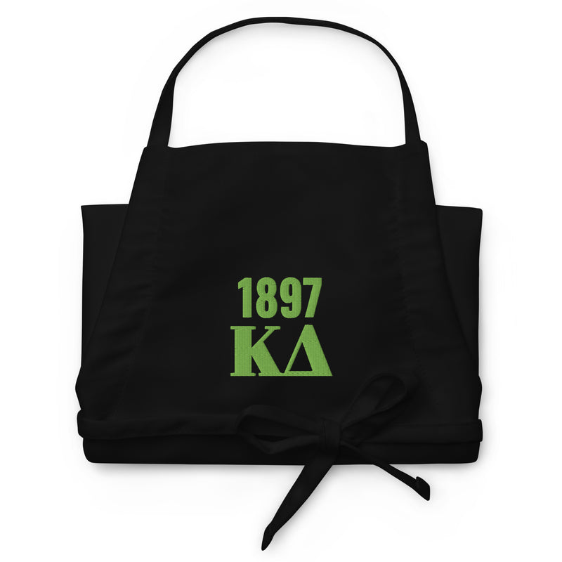 Kappa Delta 1897 Embroidered Apron shown in black with green embroidery