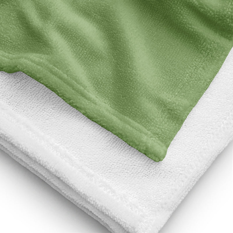 Kappa Delta Rose Beach and Bath Towel in green showing solid white reverse side