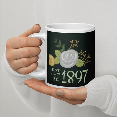 Kappa Delta 1897 Dark Green Mug shown in 20 oz size in model's hands