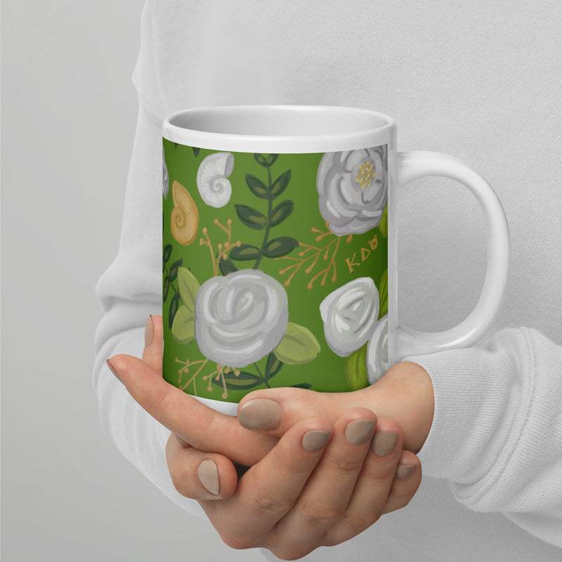 Kappa Delta Sorority Mug in green floral print shown on 20 oz mug in model&