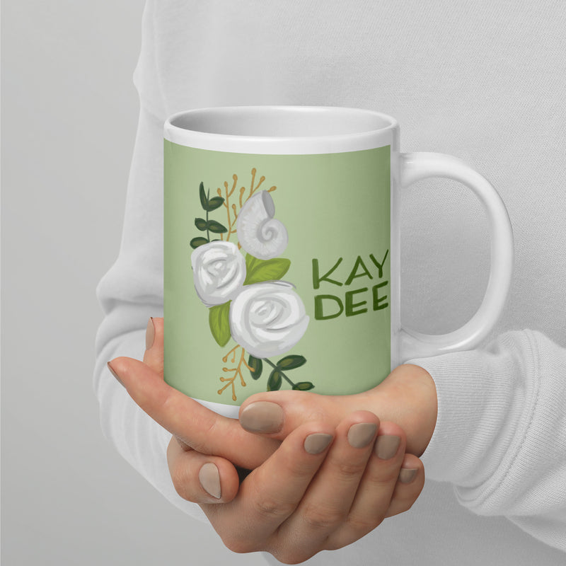 Kappa Delta "Kay Dee" Light Green Mug in 20 oz size shown in model&