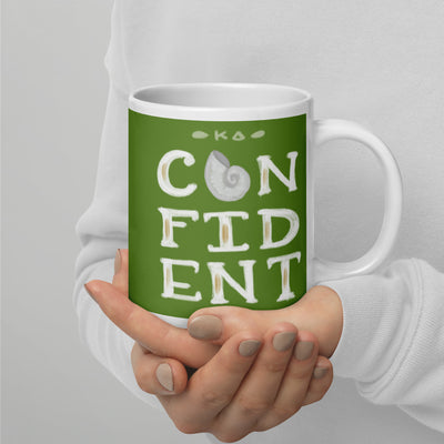 Kappa Delta green KD Confident mug in 20 oz size in model's hands