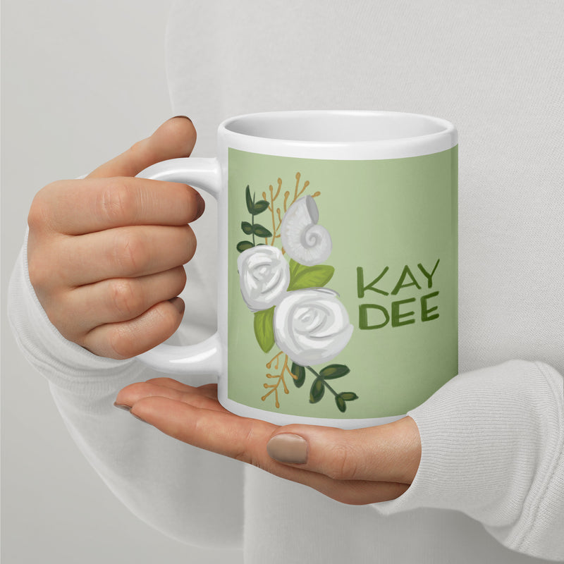 Kappa Delta "Kay Dee" Light Green Mug in 20 oz size shown in model&